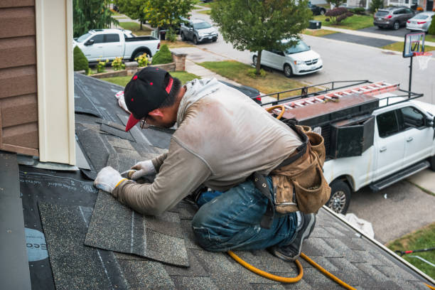 Professional Emergency Roof Repair technician working in Freeport, IL